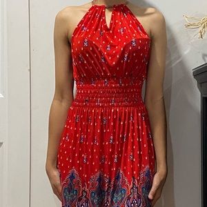 a red multicoloured dress